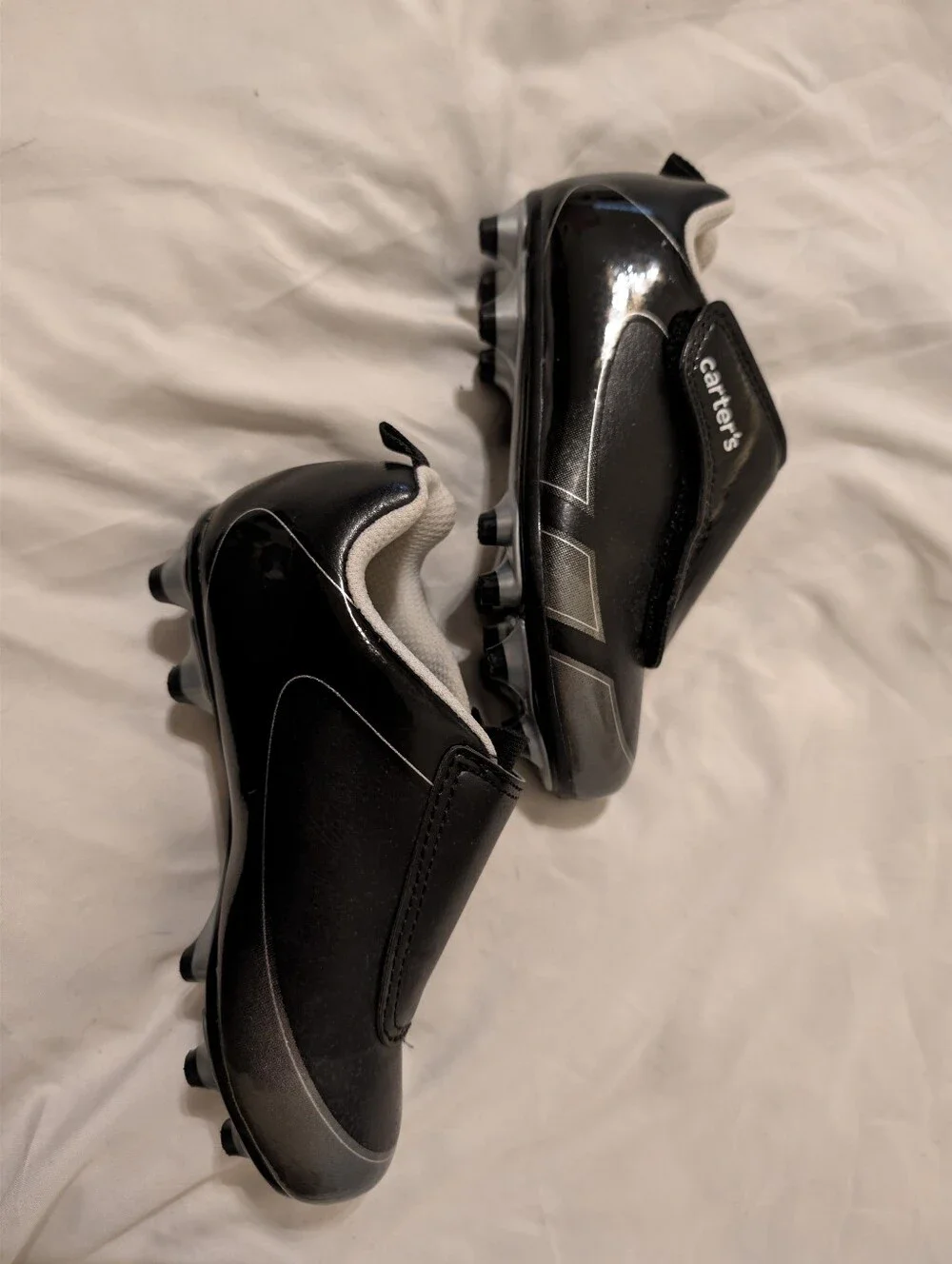 Carter's Kids Black and Silver Slip-On Cleats